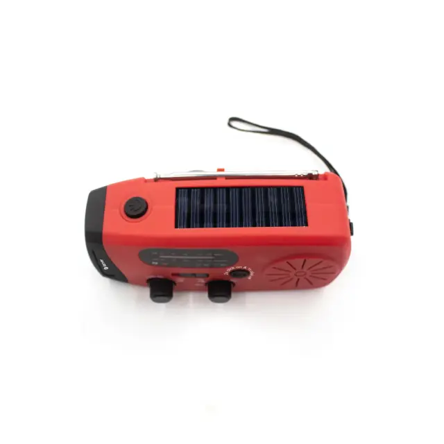 Denver SCR-2007 emergency radio with solar charging, hand crank, built-in flashlight, and SOS alarm. 